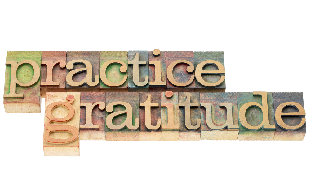 practice gratitude in wood type gratitude