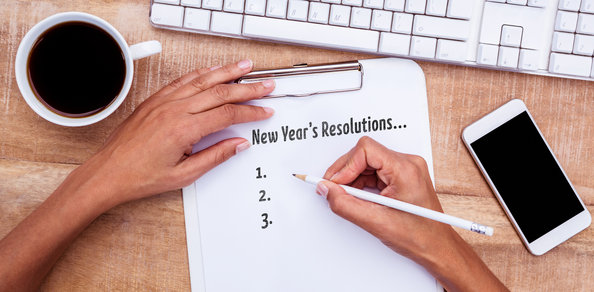 New years resolution list against businesswoman writing on clipboard on desk new years resolutions, goal setting, goals